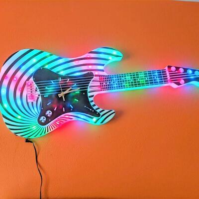 psychedelic light up guitar wall art with clock