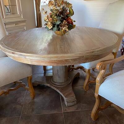 circle table with pedestal base