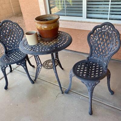 metal patio table and 2 chairs