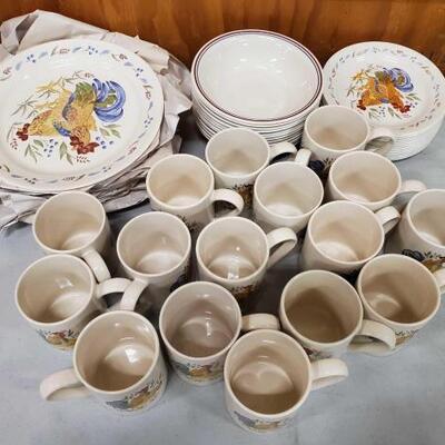 #1032 â€¢ Corelle Dish Sets. Includes 16 Stoneware Mugs, 12 Bowls, 16 Small Plates, And Approx 12 Large Plates