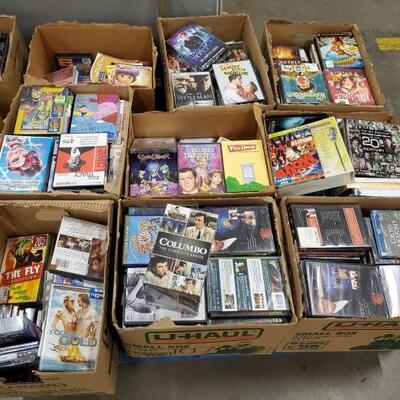 #1076 • 9 Boxes Of DVD'S

