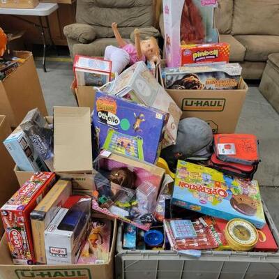 #1518 • Toys, Board Games, Bags Puzzles and More!Includes Cranium, Jaws, Cabela's Dangerous Hunts, Dolls, Dubble Bubble Pinball Gumball...