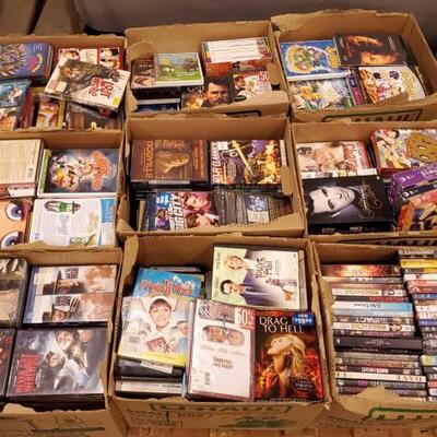 #1074 • 9 Boxes Of DVD'S