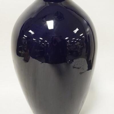 1082	LARGE COBALT BLUE POTTERY VASE MADE IN ITALY EXPRESSLY FOR JOHN WANNAMAKER HAS A RIM CHIP. 17 IN H 
