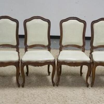 1015	SET OF 6 CARVED ITALIAN CHAIRS, 2 ARM, 4 SIDES. HAVE VINYL UPHOLSTERED SEATS & BACKS 
