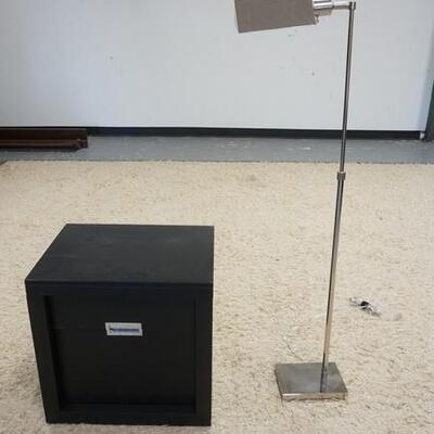 1061	2 DRAWER STAND & FLOOR LAMP, MODERN STAND HAS A FILE DRAWER. 21 IN X 17 1/2 IN 20 1/2 IN H. LAMP IS ADJUSTABLE STAND NOW AT APP. 50...
