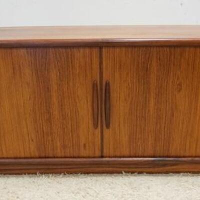 1008	DYRLUND DANSIH MODERN ROSEWOOD CREDENZA HAS A COUPLE OF VENEER BUBBLES ON THE TOP SURFACE, HAS TAMBOUR DOORS & INTERIOR DRAWERS. 75...