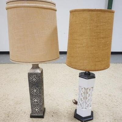 1009	2 MODERN CERAMIC LAMPS, GRAY COLORED LAMP HAS A GLAZE FLAKE NEAR THE TOP SOCKET. TALLEST IS 45 IN H 
