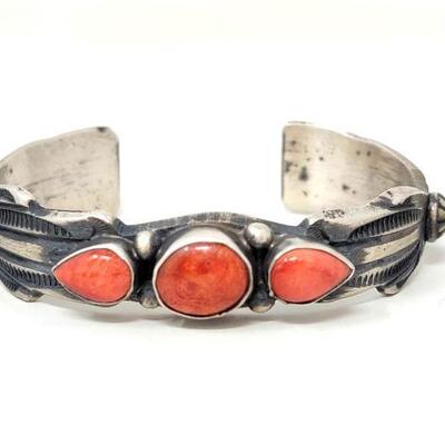 #622 • Native American Sterling Silver Coral Engraved Cuff: Beautiful sterling silver cuff has 3 accent coral stones.
Weighs Approx 36.3g...