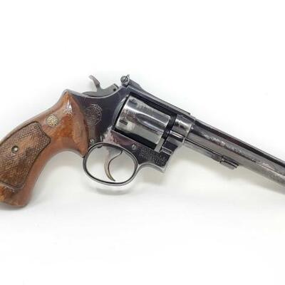 #1118 • Smith & Wesson CTG .38spl Revolver Serial Number: K877111 Barrel Length: 6