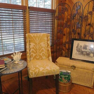 Upholstered chair, rattan chest, table