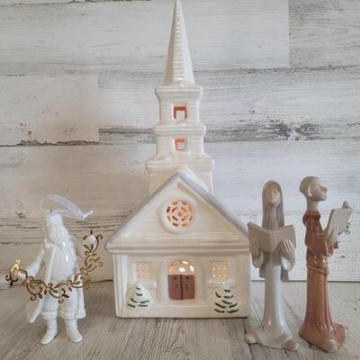 (3) Holiday Decor: Lighted Ceramic Church, Music Box with Carolers and Hallmark Santa Ornament