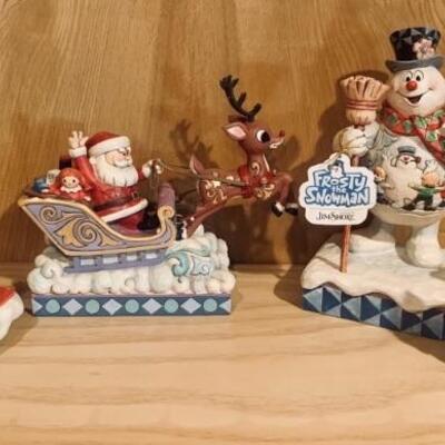 (4) Ceramic Christmas Figurines: 2-Santa,
A Reindeer, and Frosty the Snowman