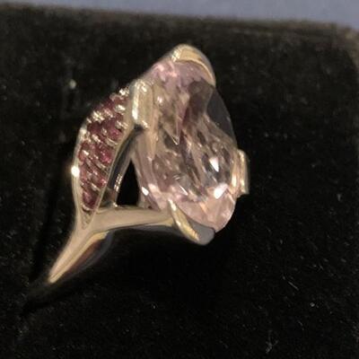 Sterling Silver Cocktail Ring with Large Light Pink Stone Stone and Several Small Pink Stones on Each Side. Size 7