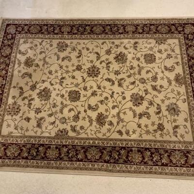 Classic Design Traditions Ivory Oriental Area Rug
Measures 63in x 87in