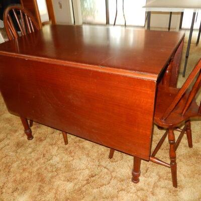 Double drop leaf table with two chairs - $175 