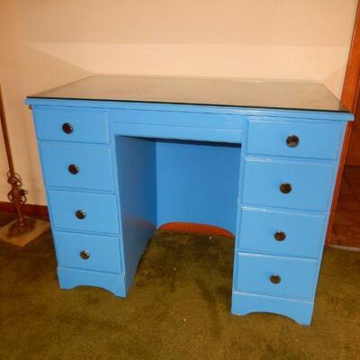 Blue desk with protective glass top - $75