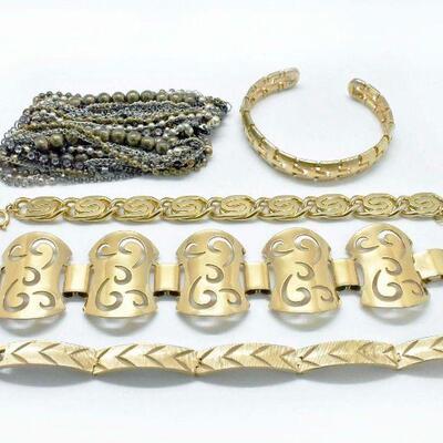 5 Gold Tone Bracelets