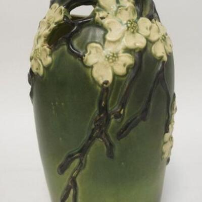 1027	ROSEVILLE GREEN DOGWOOD 14 1/2 IN VASE HAS A RETICULATED TOP SECTION, HAS A POUR MARK ON ONE FLOWER PETAL
