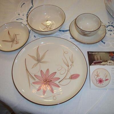 Large place setting of Winfield China "Passion Flower" Dinnerware.