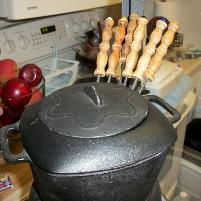 Vintage Cast Iron Fondue Set shown with 6 Forks
