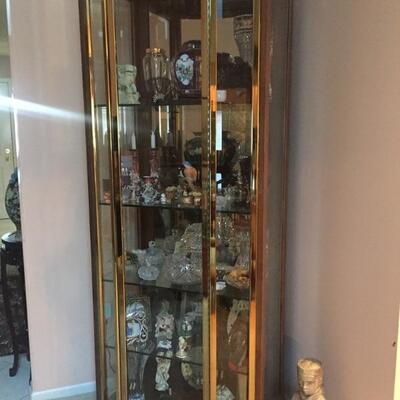 Curio cabinet filled with lots of trinkets!