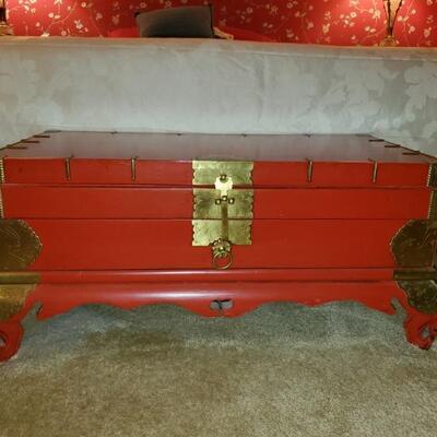 Beautiful red and brass trunk