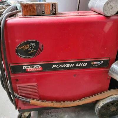 #2082 • Lincoln Power Mig 255 Welder Lincoln Power Mig 255 Welder With Wire, Gloves & Tank.