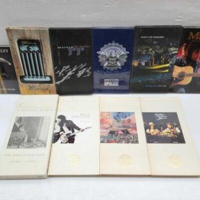 #2592 â€¢ Book Collection of CDs: Includes Martin Briley The Mercury Years, Stevie Ray Vaughan, Marvin Gaye The Master 1961-1984, Message...