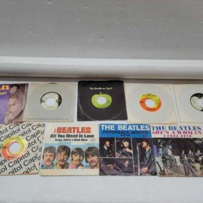 #2588 â€¢ (9) Beatles Records and (2) Large Posters: Records Include Revolution, Get Back, I Should Have Known Better, All You Need Is...