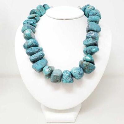 #1380 • Dyed Howlite Boulder Necklace- 323.4g The largest turquoise stone measures about 1