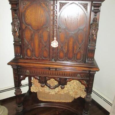 Vintage Cupboard With Ornate Renaissance Knight Carved Detailing  