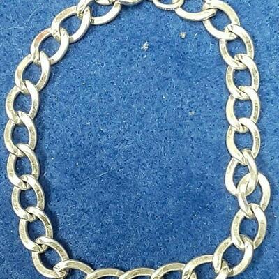 https://www.ebay.com/itm/115136287966	LAN3472 VINTAGE 7 INCH STERLING SILVER CHARM BRACELET (10.9 GRAMS)		BIN	 $19.99 
