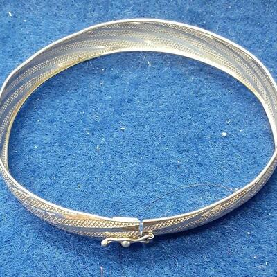 https://www.ebay.com/itm/125041600174	LAN3414 VINTAGE HOB STERLING SILVER & 10K GOLD PLATED BRACELET (5.6 GRAMS)		BIN	 $19.99 
