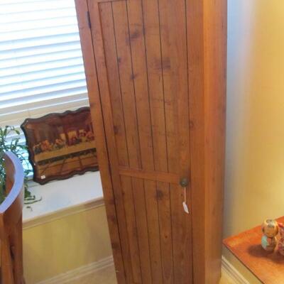 TALL WOODEN STORAGE CABINET
