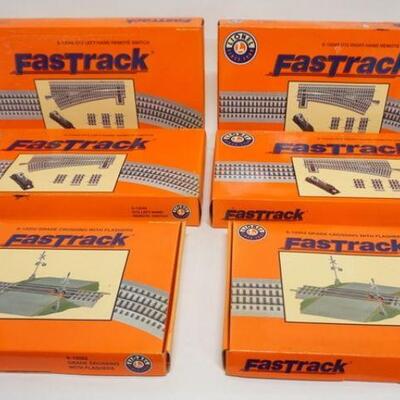 1119	LIONEL FAST TRACKS LOT O GAUGE, REMOTE SWITCHES & CROSSINGS
