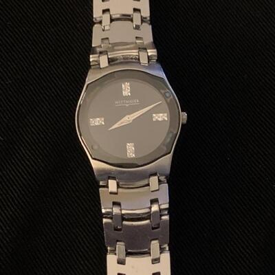Ladies Wittnauer Watch with Sapphire Crystal and
Diamonds at 12, 3, 6 & 9. Water Resistant