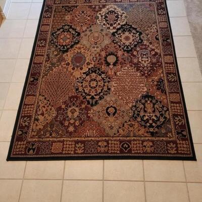 Shaw Area Rug is 5ft 7in X 7ft 7in