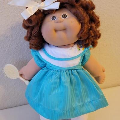 Vingage Cabbage Patch Doll on Stand