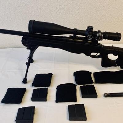 Accuracy International Sniper Rifle 7.62x51 -Nightforce NXS
12-42 x 56 scope 
Four Magazines
Blackhawk Case