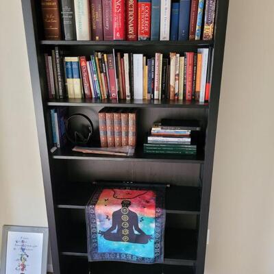 one of two book cases, lots of books, all sold separately