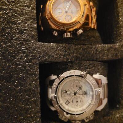 Two Invicta women's watches, sold separately