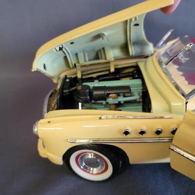 1949 Buick Roadmaster Convertible Beige 1/8 Scale Diecast Model Car by Motormax Timeless Classics
11.5in L x 4in W x 2.75in H