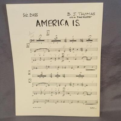 Str. Bass Sheet Music: AMERICA IS by BJ Thomas
Arrangement by Dave Wolfert