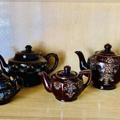 (4) Hand Painted Teapots: 2-Black, 2-Brown