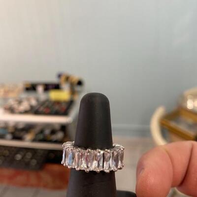 White sapphire eternity band set in sterling silver