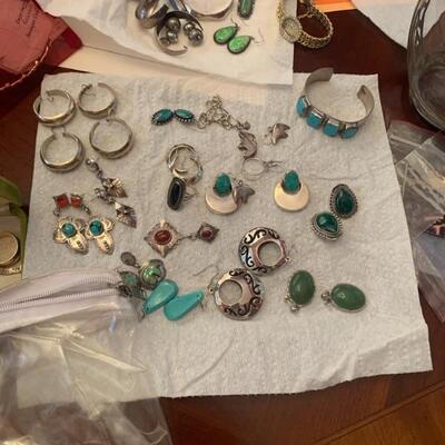 Lots and lots of jewelry turquoise gold silver many things to choose from