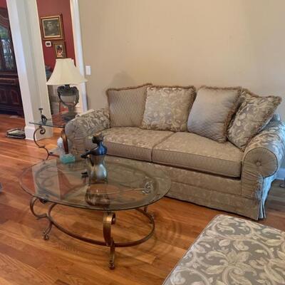 This is a four piece couch loveseat chair and ottoman pristine condition