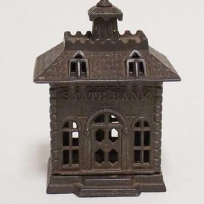 1049	*STATE BANK* STILL BANK, CAST IRON, 3 1/4 IN WIDE X 4 1/4 IN HIGH
