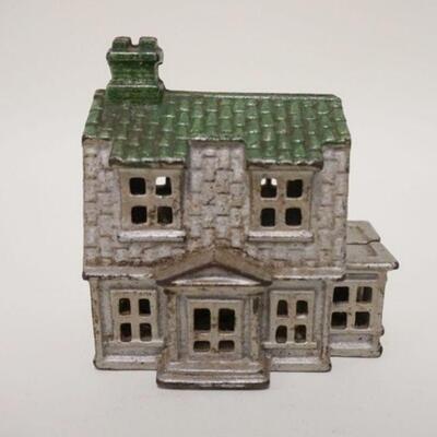 1017	HOUSE STILL BANK, GREEN & SILVER DECORATION, CAST IRON, 3 7/8 IN WIDE X 4 1/8 IN HIGH
